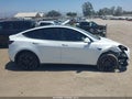 2023 Tesla Model Y — photo 12 of 15 | VIN 7SAYGDEE4PF888468