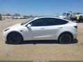 2023 Tesla Model Y — photo 13 of 15 | VIN 7SAYGDEE4PF888468
