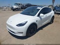 2023 Tesla Model Y — photo 2 of 15 | VIN 7SAYGDEE4PF888468