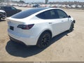 2023 Tesla Model Y — photo 4 of 15 | VIN 7SAYGDEE4PF888468