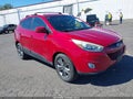 2015 Hyundai Tucson — photo 1 of 16 | VIN KM8JUCAGXFU091247