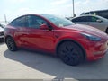 2024 Tesla Model Y — photo 13 of 18 | VIN 7SAYGAEE2RF210044