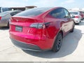 2024 Tesla Model Y — photo 4 of 18 | VIN 7SAYGAEE2RF210044
