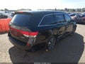 2014 Honda Odyssey — photo 4 of 15 | VIN 5FNRL5H92EB015185
