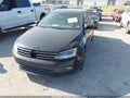 2016 Volkswagen Jetta — photo 2 of 18 | VIN 3VWD17AJ9GM297790