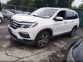 2018 Honda Pilot — photo 2 of 17 | VIN 5FNYF6H02JB003008