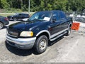 2003 Ford F-150 — photo 2 of 19 | VIN 1FTRW08L23KD04623