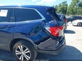 2018 Honda Pilot — photo 15 of 16 | VIN 5FNYF6H55JB040386