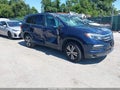 2018 Honda Pilot — photo 1 of 16 | VIN 5FNYF6H55JB040386