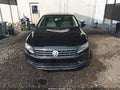 2016 Volkswagen Passat — photo 12 of 16 | VIN 1VWBT7A39GC015815