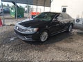 2016 Volkswagen Passat — photo 2 of 16 | VIN 1VWBT7A39GC015815