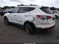 2014 Hyundai Santa Fe — photo 3 of 16 | VIN 5XYZU3LB4EG168901