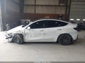 2026 Tesla Model Y — photo 13 of 15 | VIN 7SAYGDEE0TA661592
