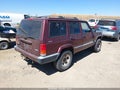 2000 Jeep Cherokee — photo 4 of 11 | VIN 1J4FF48S9YL253151