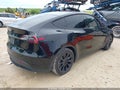 2024 Tesla Model Y — photo 4 of 15 | VIN 7SAYGDEE4RA219035