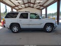 2004 GMC Yukon — photo 13 of 16 | VIN 1GKEK13Z44J177879