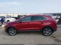 2015 Lincoln MKC — photo 14 of 16 | VIN 5LMCJ2A98FUJ26104