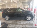 2018 Chevrolet Equinox — photo 13 of 16 | VIN 2GNAXSEV2J6238805