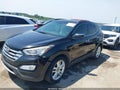 2013 Hyundai Santa Fe — photo 2 of 10 | VIN 5XYZU3LA0DG024946