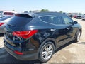 2013 Hyundai Santa Fe — photo 4 of 10 | VIN 5XYZU3LA0DG024946