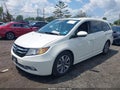 2014 Honda Odyssey — photo 2 of 16 | VIN 5FNRL5H91EB070291