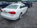 2016 Volkswagen Passat — photo 4 of 16 | VIN 1VWBT7A30GC034687