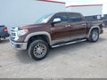 2015 Toyota Tundra — photo 2 of 16 | VIN 5TFGY5F14FX188199