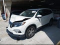2017 Honda Pilot — photo 2 of 16 | VIN 5FNYF5H56HB034018