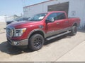 2016 Nissan Titan — photo 2 of 16 | VIN 1N6BA1F48GN513240