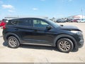 2017 Hyundai Tucson — photo 13 of 16 | VIN KM8J3CA43HU265736