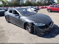 2014 Tesla Model S — photo 1 of 18 | VIN 5YJSA1H11EFP50038