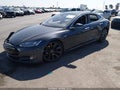 2014 Tesla Model S — photo 2 of 18 | VIN 5YJSA1H11EFP50038