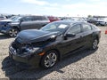 2016 Honda Civic — photo 2 of 17 | VIN 2HGFC2F58GH552207