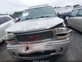 2006 GMC Yukon XL — photo 12 of 16 | VIN 1GKFK66UX6J116623