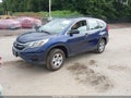 2015 Honda CR-V — photo 2 of 15 | VIN 2HKRM4H35FH630531