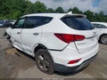 2017 Hyundai Santa Fe — photo 3 of 17 | VIN 5XYZU3LB2HG400626