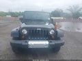 2013 Jeep Wrangler Unlimited — photo 12 of 16 | VIN 1C4HJWEG2DL684658