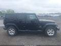 2013 Jeep Wrangler Unlimited — photo 13 of 16 | VIN 1C4HJWEG2DL684658