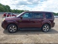 2015 Honda Pilot — photo 14 of 16 | VIN 5FNYF3H6XFB016261
