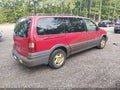 1999 Pontiac Montana — photo 4 of 11 | VIN 1GMDX03EXXD332594