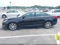 2013 Kia Optima — photo 14 of 16 | VIN 5XXGR4A69DG183692