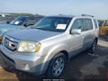 2010 Honda Pilot — photo 2 of 16 | VIN 5FNYF3H98AB010350