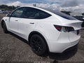 2024 Tesla Model Y — photo 3 of 19 | VIN 7SAYGAEE5RF993361
