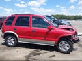 2000 Kia Sportage — photo 14 of 19 | VIN KNDJB7235Y5664257