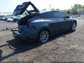 2024 Tesla Model Y — photo 4 of 14 | VIN 7SAYGDEE3RF036051