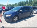 2014 Honda Odyssey — photo 2 of 18 | VIN 5FNRL5H29EB122012