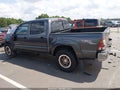 2011 Toyota Tacoma — photo 14 of 16 | VIN 5TFJU4GN9BX006889