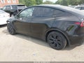 2025 Tesla Model Y — photo 3 of 18 | VIN 7SAYGDEDXSA348846