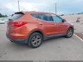 2014 Hyundai Santa Fe — photo 4 of 16 | VIN 5XYZT3LB6EG152542