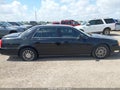 2004 Cadillac Deville — photo 13 of 16 | VIN 1G6KE57Y84U120195